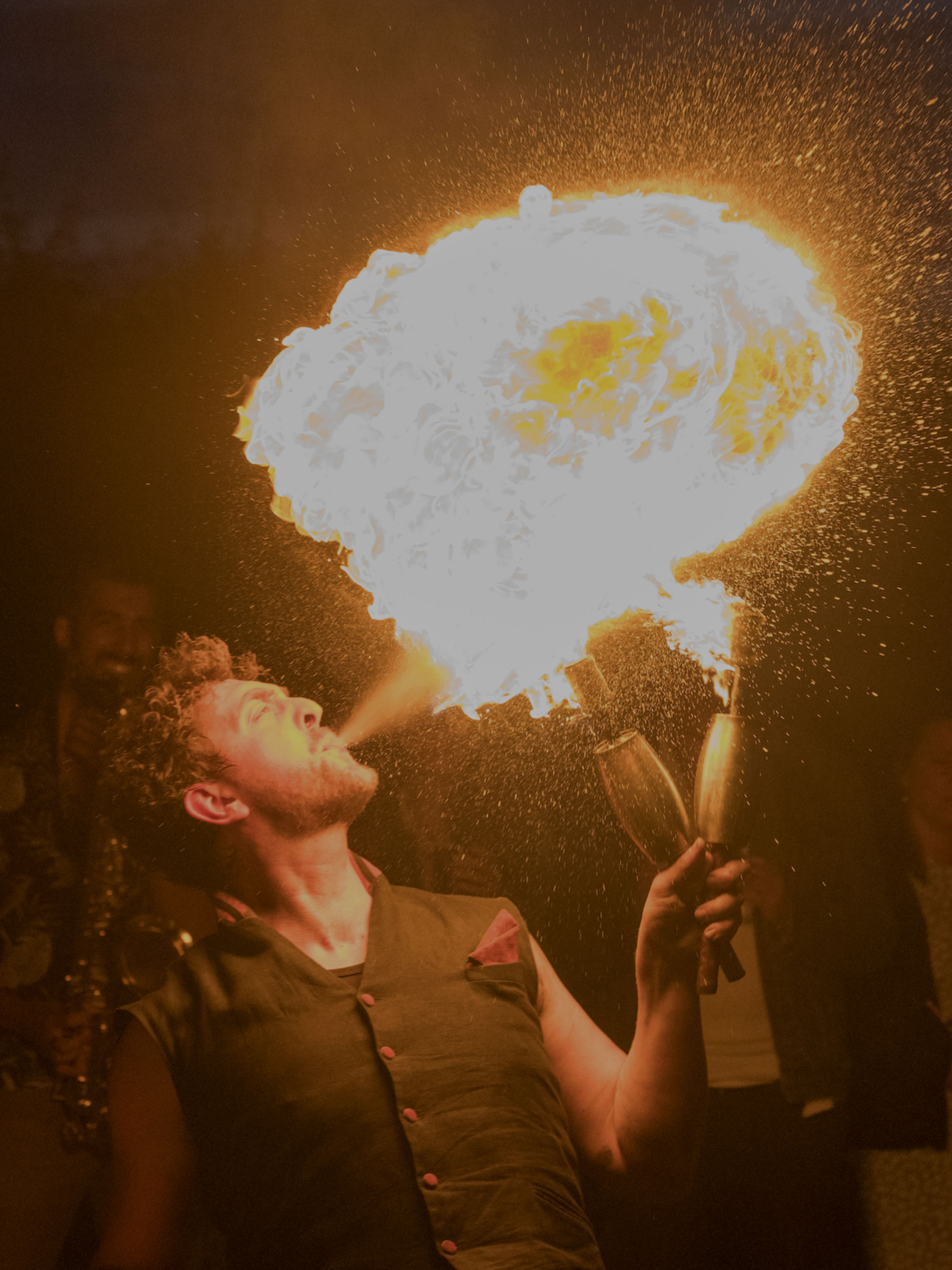 Fire breather performer performing in Cambridge at private event